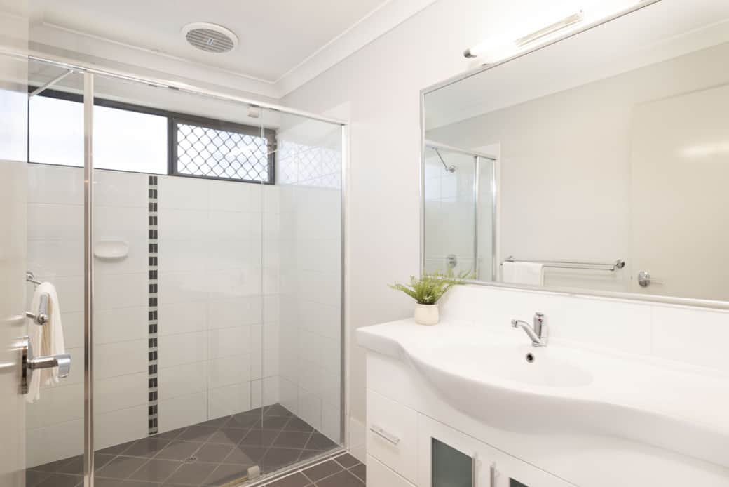 Bathroom: Stylish bathroom with walk-in shower, vanity, and clean finishes 