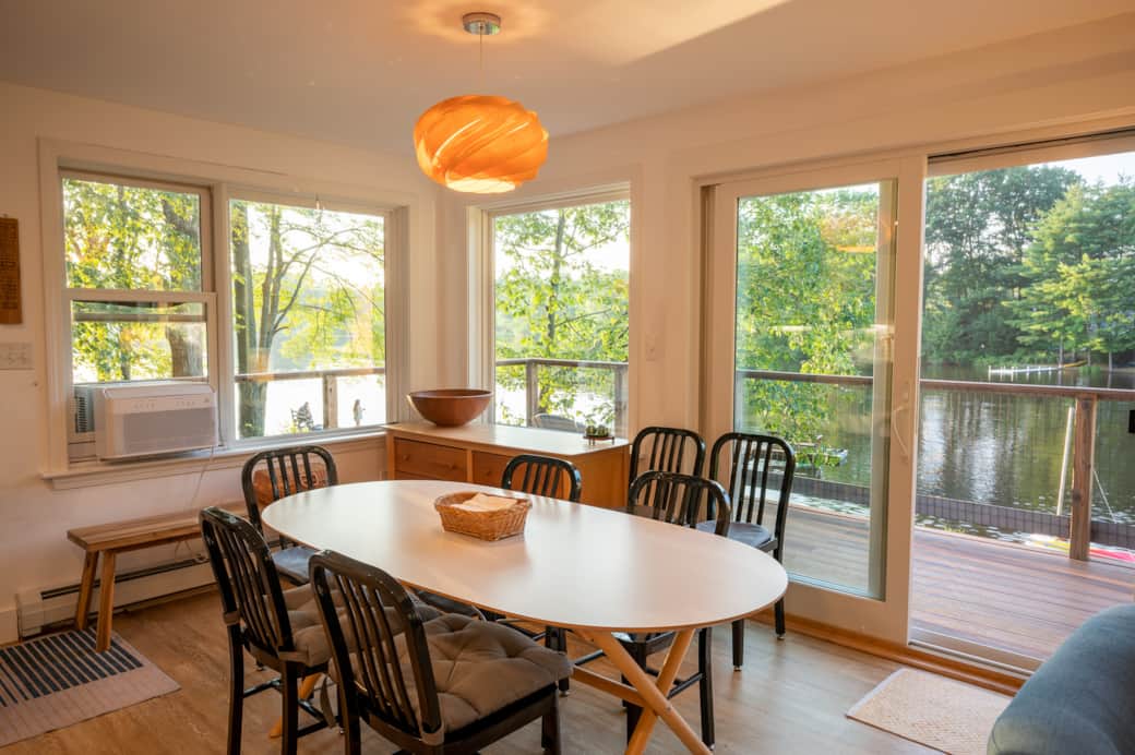 Watch the day end from the dining table surrounded by glass.