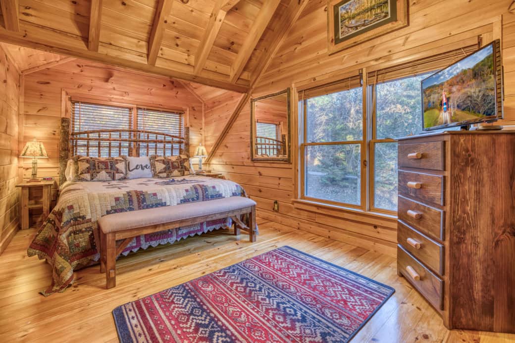 Primary bedroom with King size bed and comfy blankets
