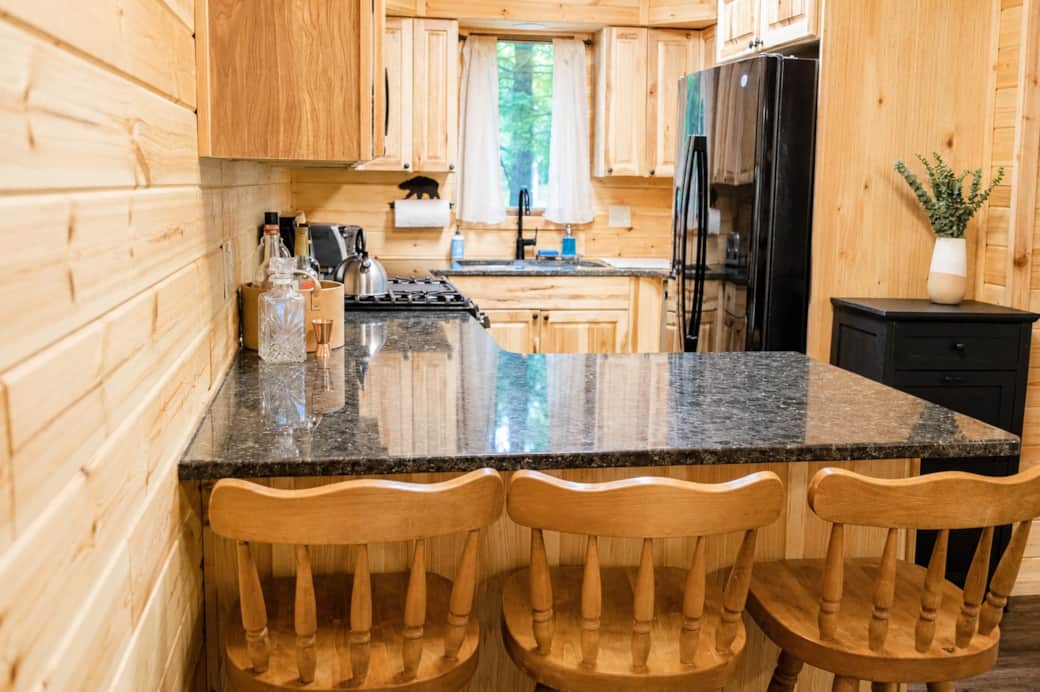Kitchen island with breakfast bar seating.