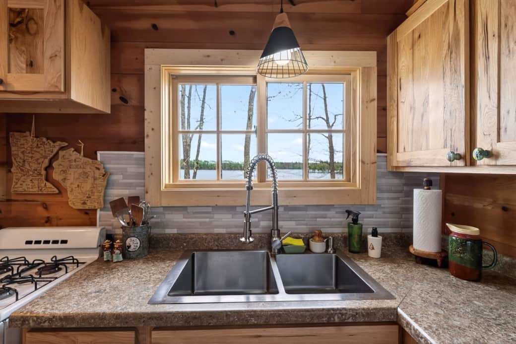 Wash your dishes while enjoying a beautiful view of the lake. No dishwasher. 