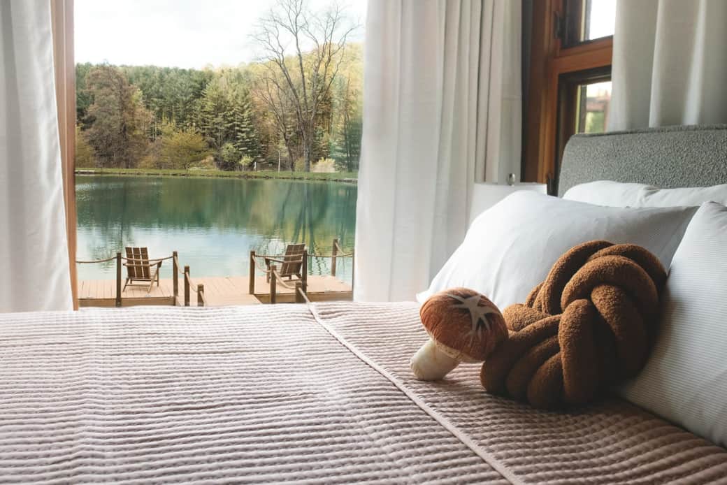 Comfortable bed inside Pond Slider cabin retreat