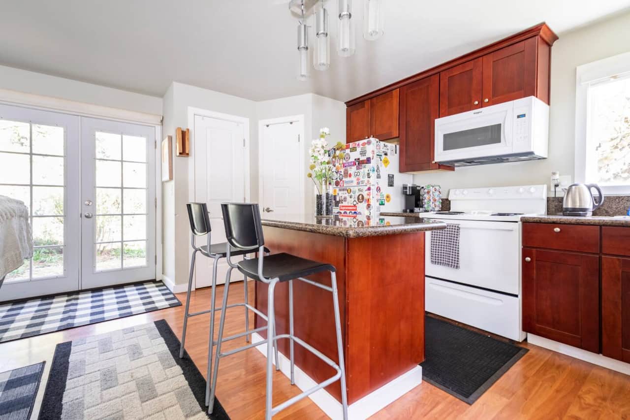 Garden-view kitchen window brings in natural light while you cook
