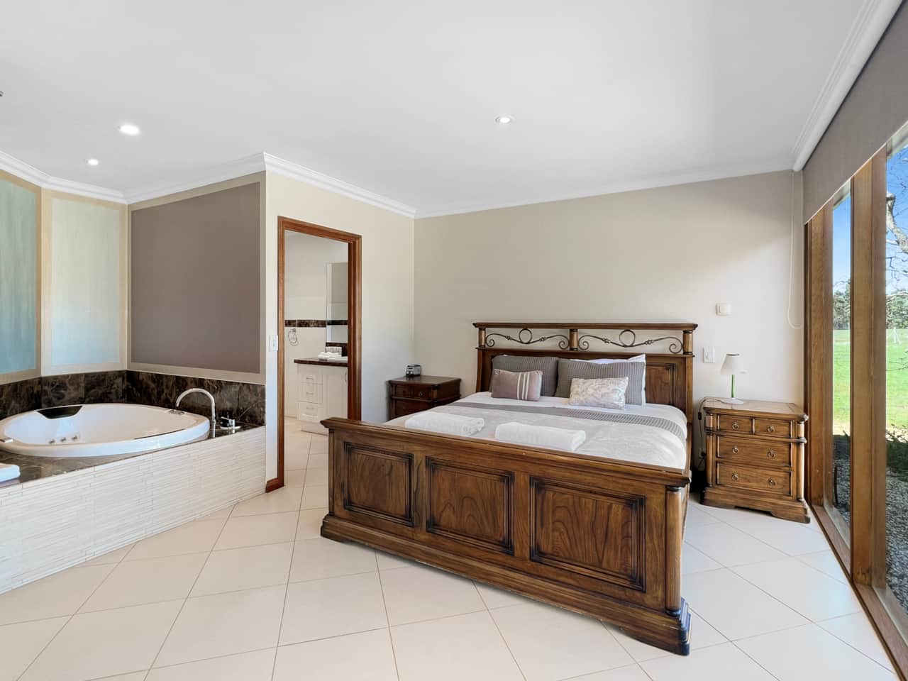 Indulge in luxury in the master bedroom with a double spa bath and ensuite for ultimate relaxation.