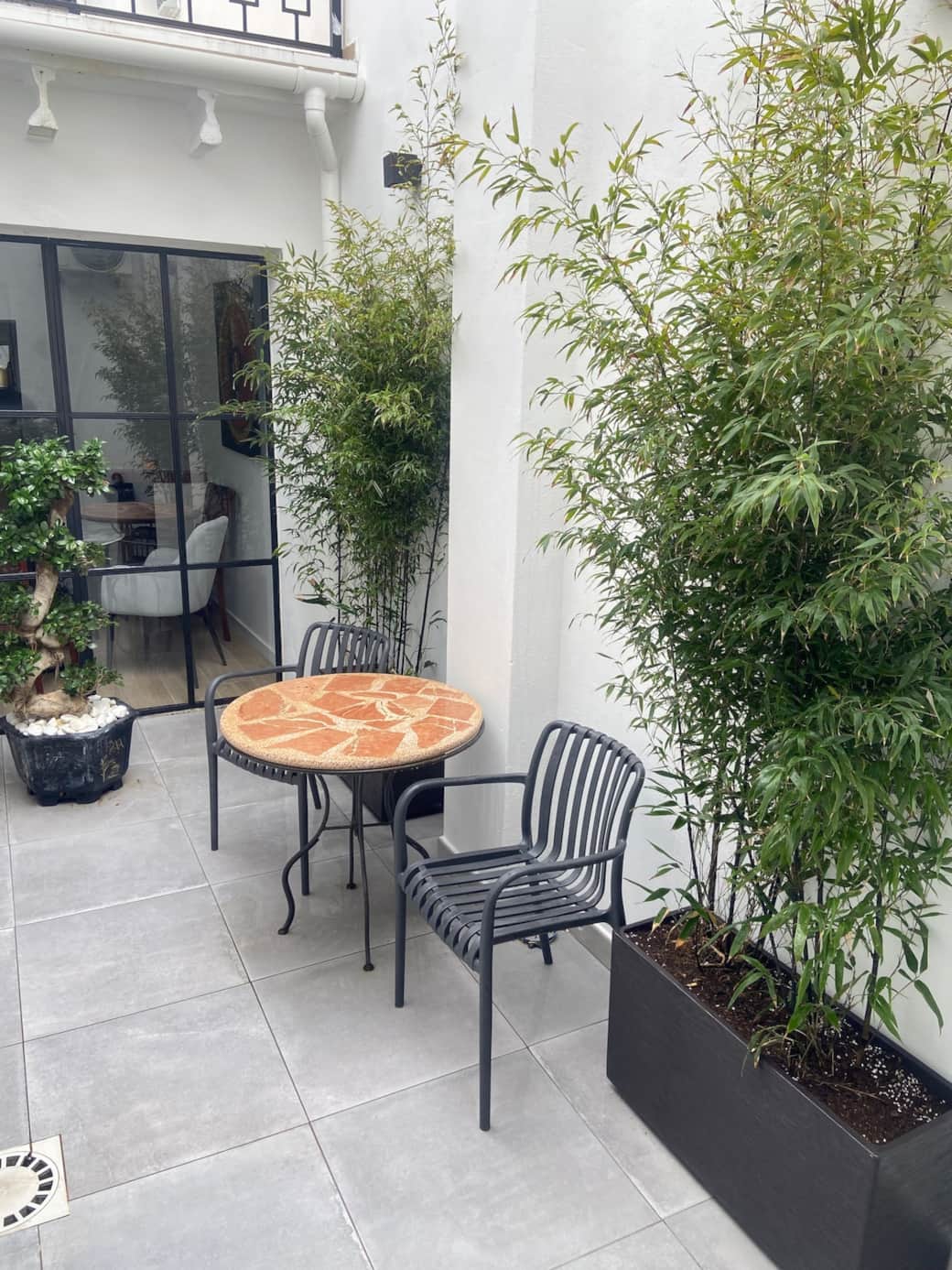 Private patio with seating for morning coffee.
