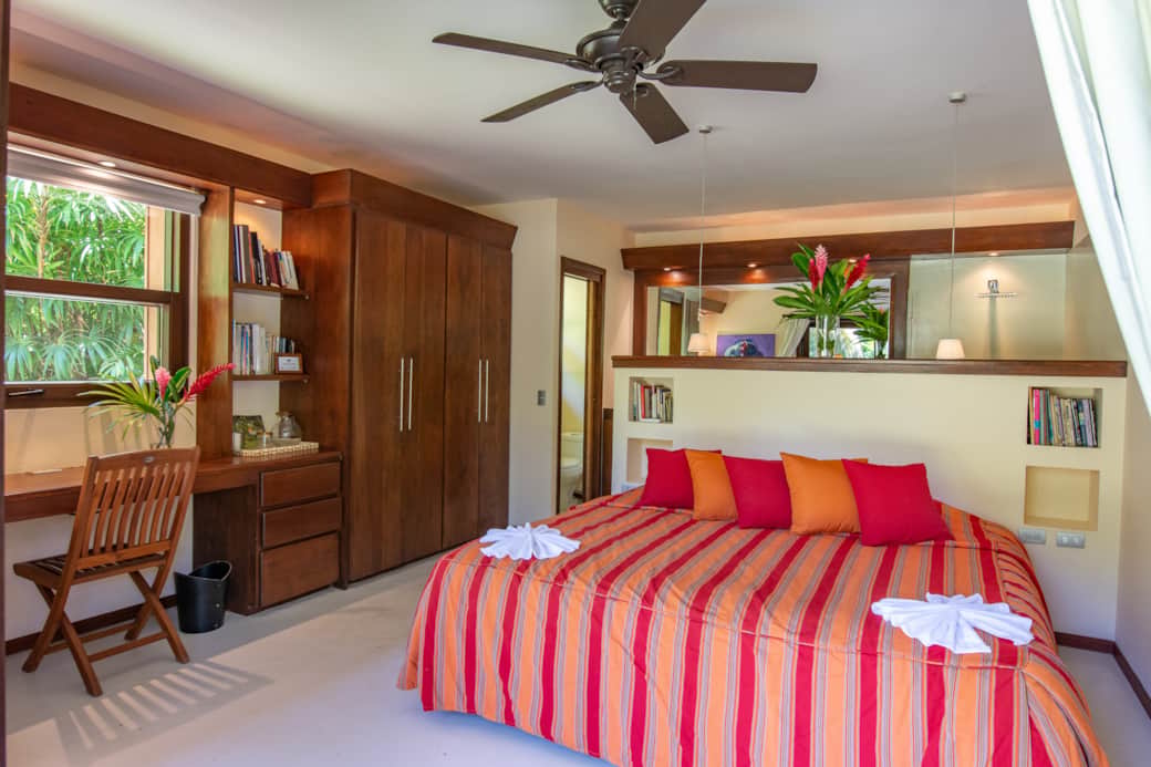 Beachfront house, master bedroom with private bathroom, a/c and desk Beachfront house, master bedroom with private bathroom, a/c and desk
