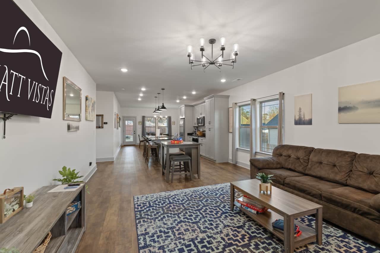 Open Concept Living Room with 65" 4K Flat Screen & Board Games