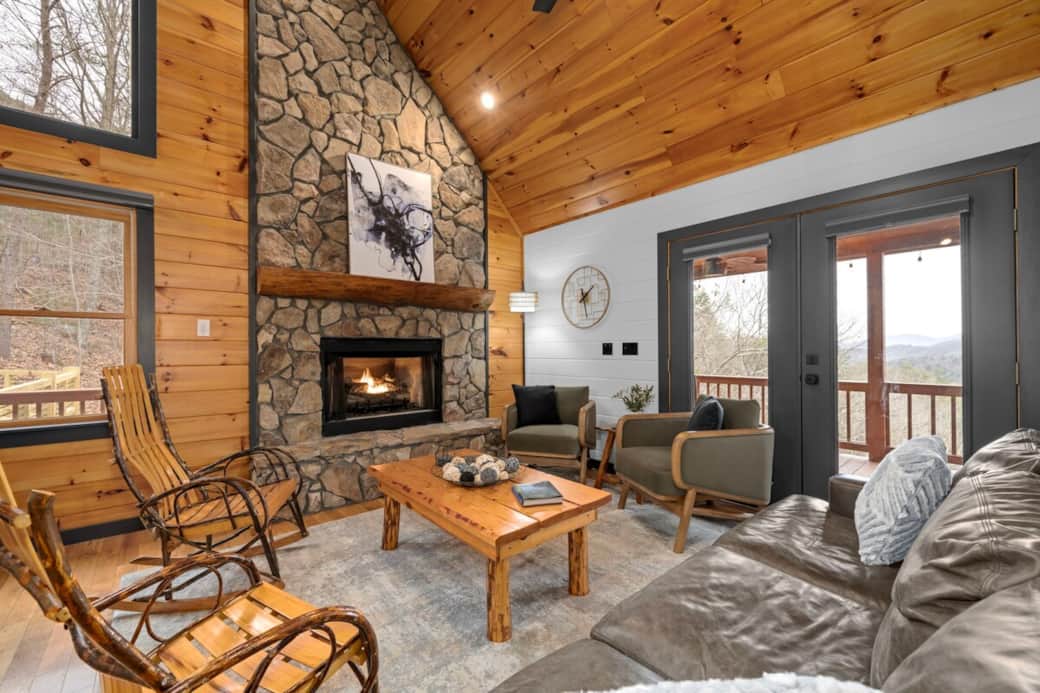 Cozy up by the fire in this comfortable living room - the perfect place to make memories with those you love.