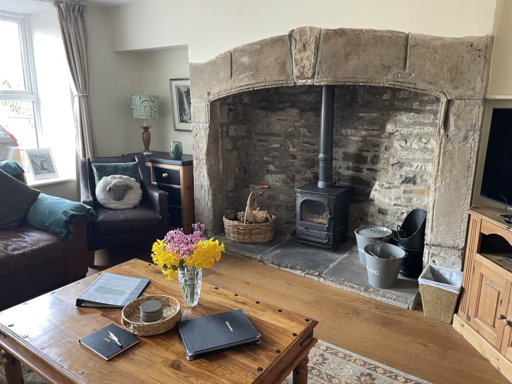 Spacious Living Room - With original 200 year old inglenook fireplace and log burner. 