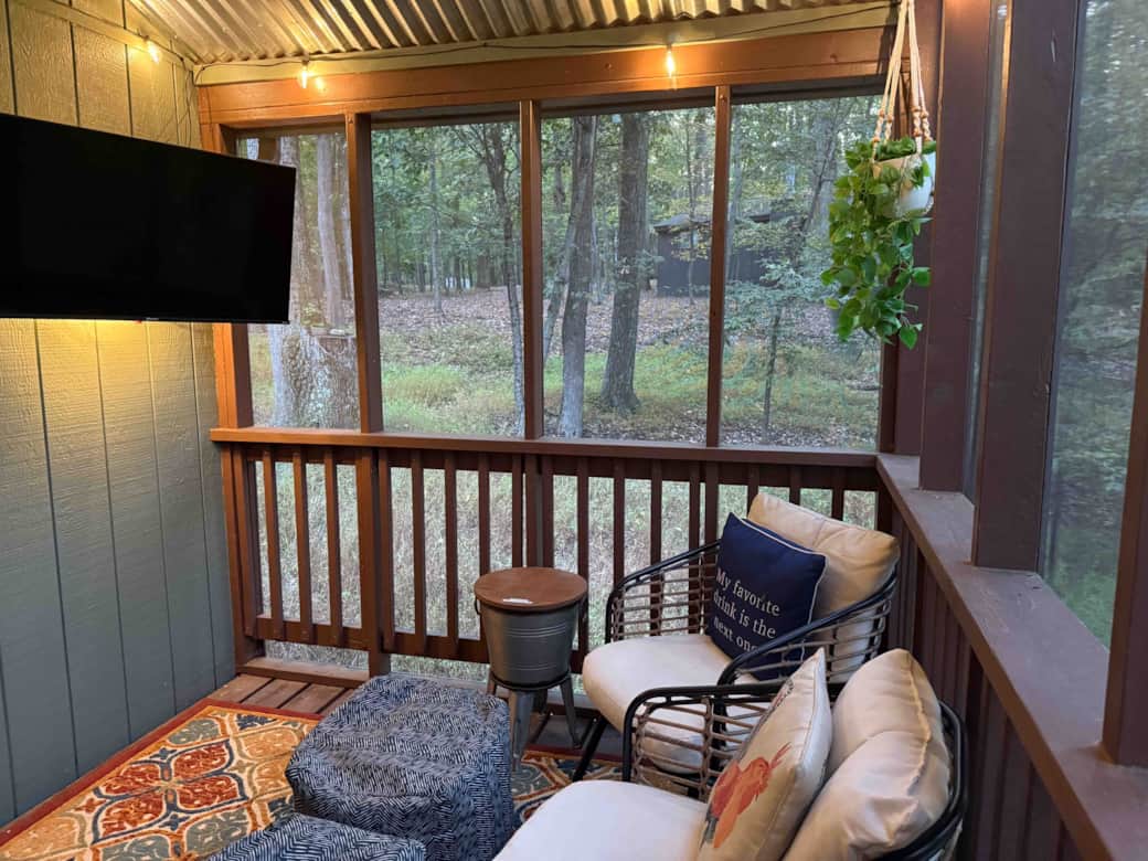 Watch tv or enjoy the sounds of nature on the screened porch.