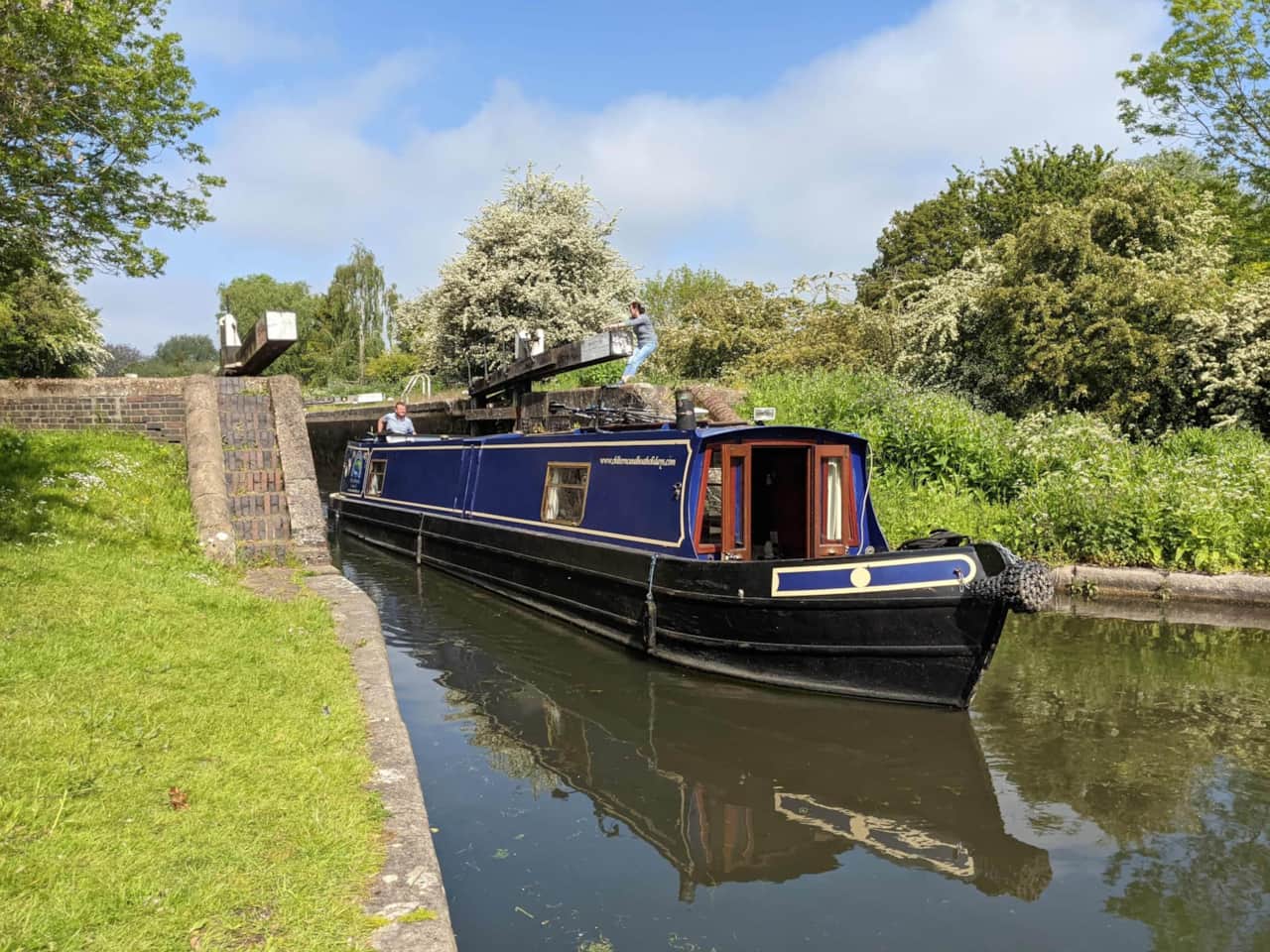 Canal Boat driving out of a lock