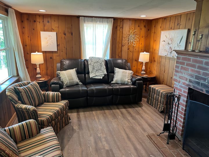 Relax, catch a show or build a fire in this cozy living room.