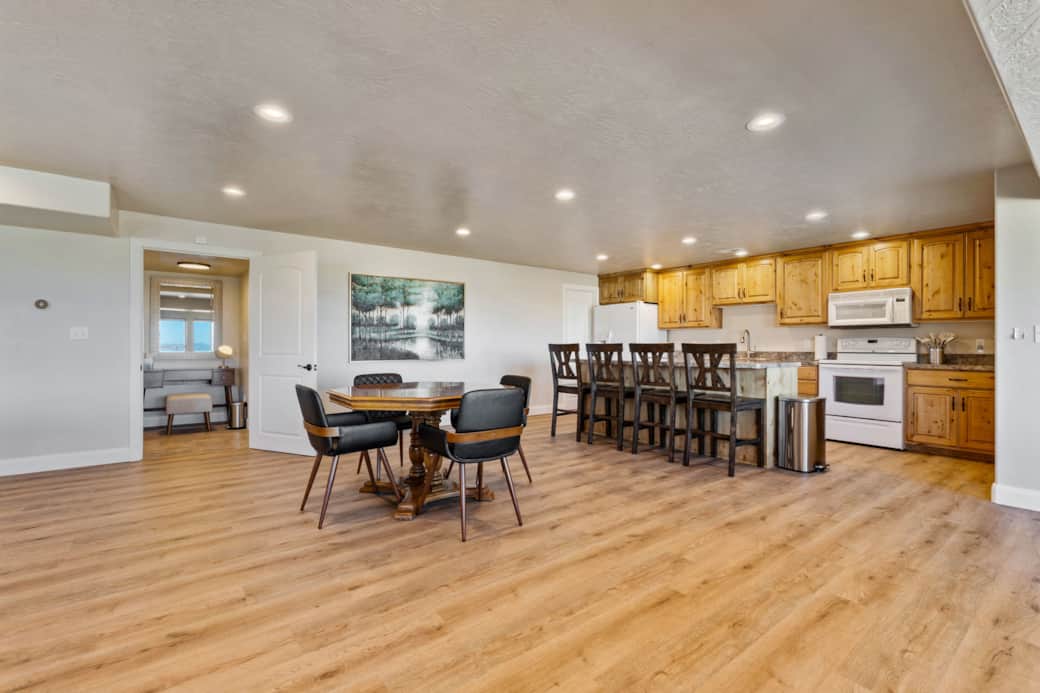 Downstairs Kitchen, Island, Game Table and Bathroom 