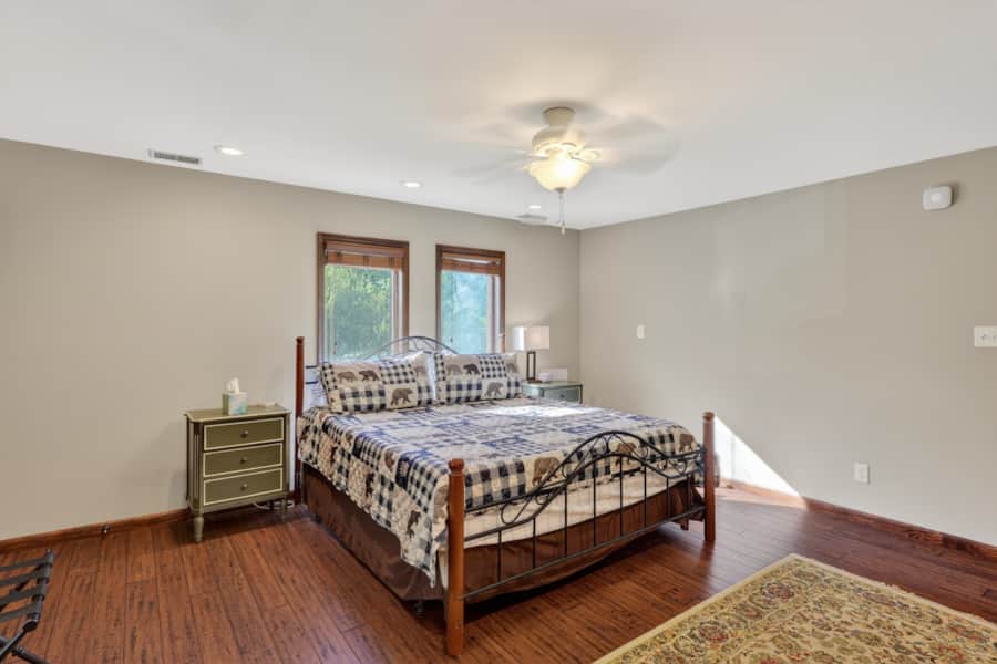 King bedroom with ceiling fan
