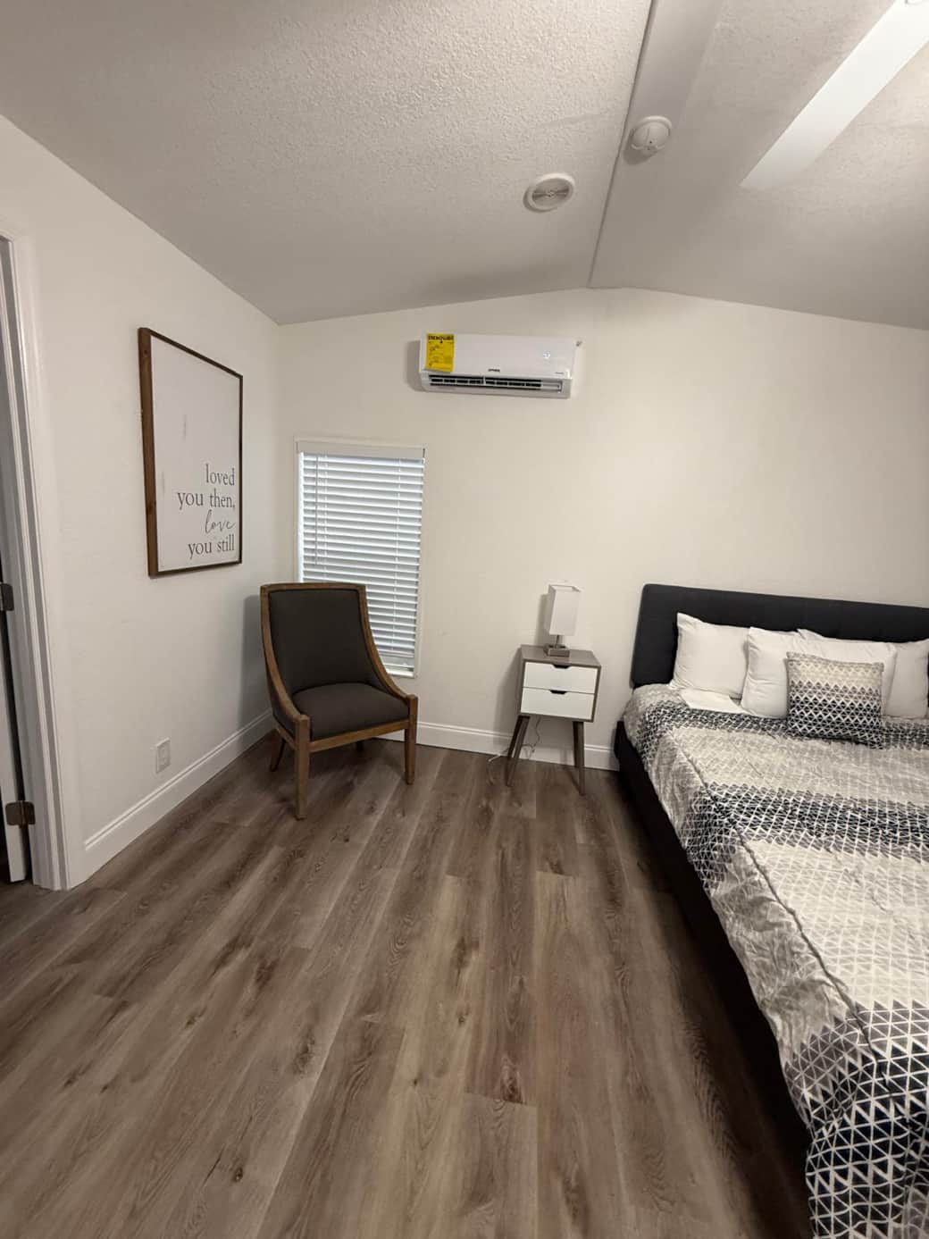 Comfortable bedroom with AC and a cozy chair for reading or relaxing. Lakeland, FL
