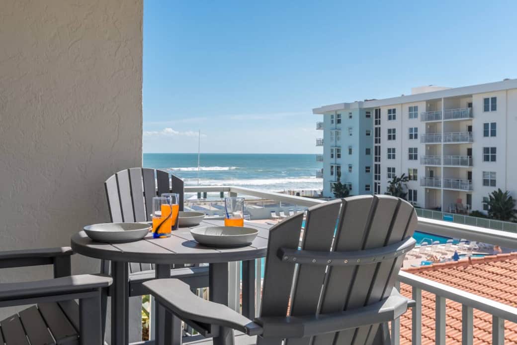 Sip coffee, read a book, or enjoy a cocktail on the oceanview balcony with 5 bar height adirondack chairs.  Perfect for watching the waves roll in and comfy enough to stay all day if you like.