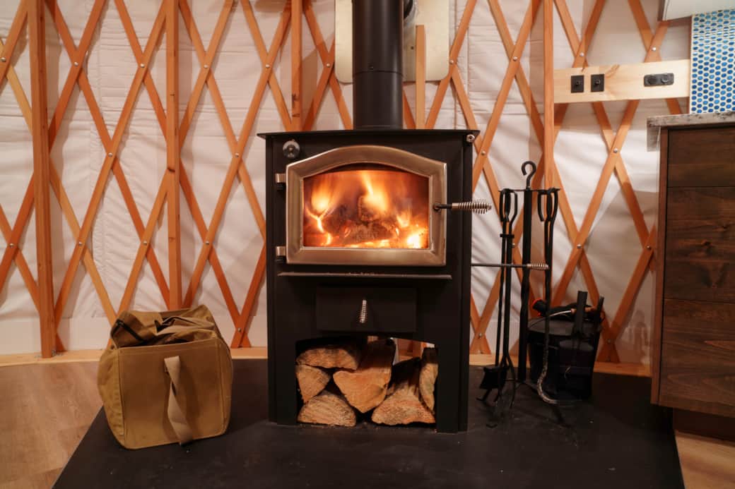 Stoves keep the yurt toasty. Yurts are stocked with wood