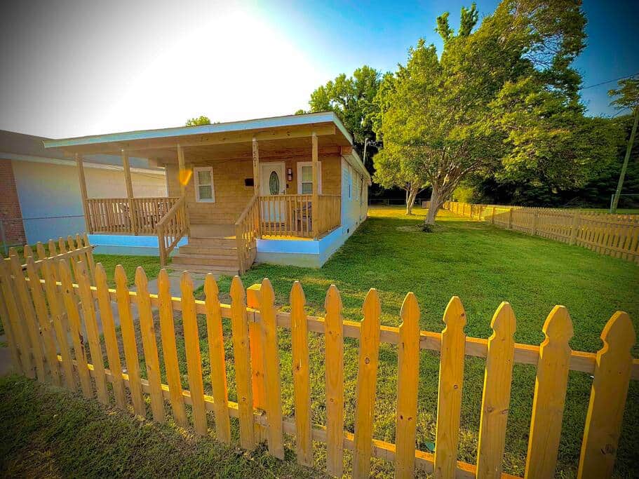Very large fenced &amp; private front and backyard with grass and mature trees
