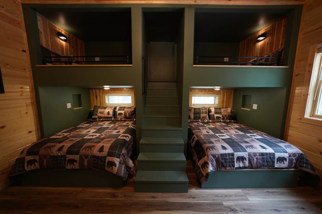 2 queens on bottom. 2 fulls on top. Bedroom in loft.