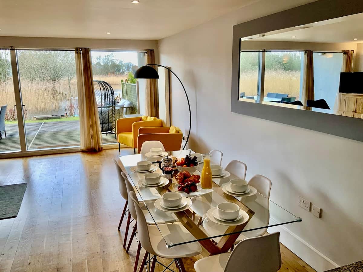 Our dining table comfortably seats 8-10 people, with high chairs and a booster seat available