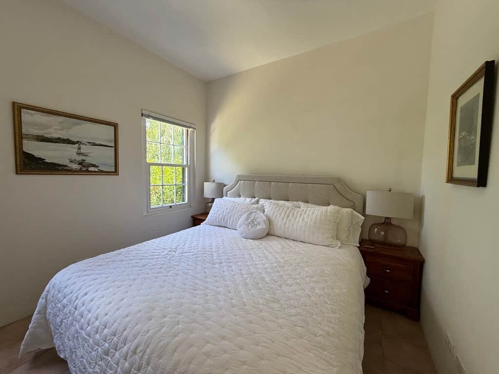 King Size bed with organic, high thread count linens and luxe pillows. 