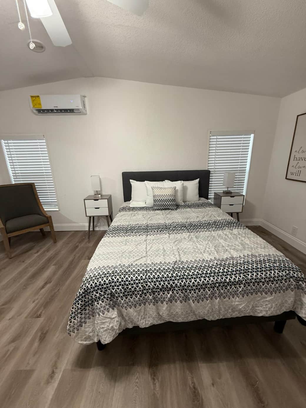Spacious queen bed with premium linens and plush pillows for ultimate comfort. Lakeland, FL