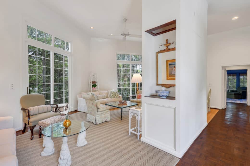 From the foyer, the house opens up into the Great Room and Dining Area. To the right is the kitchen.