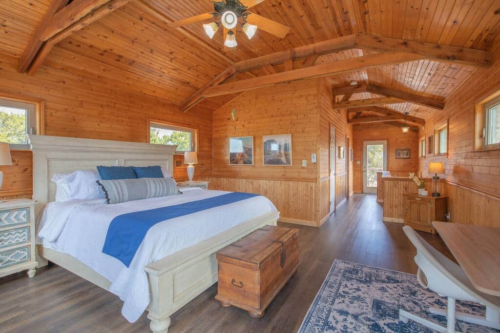 The main bedroom has an open floor plan, with a bathroom and a kids room  nearby