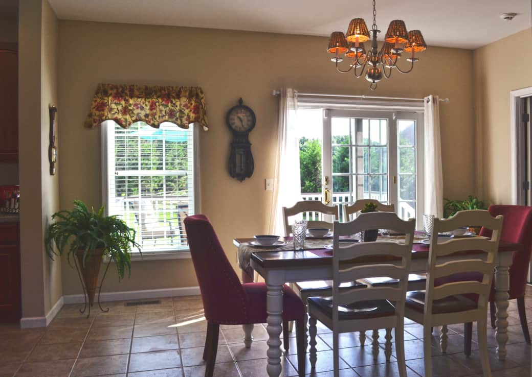 Dining Room w/ Glass Door Out To Backyard