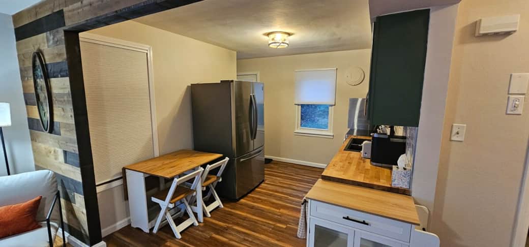 Kitchen with table setup for 2