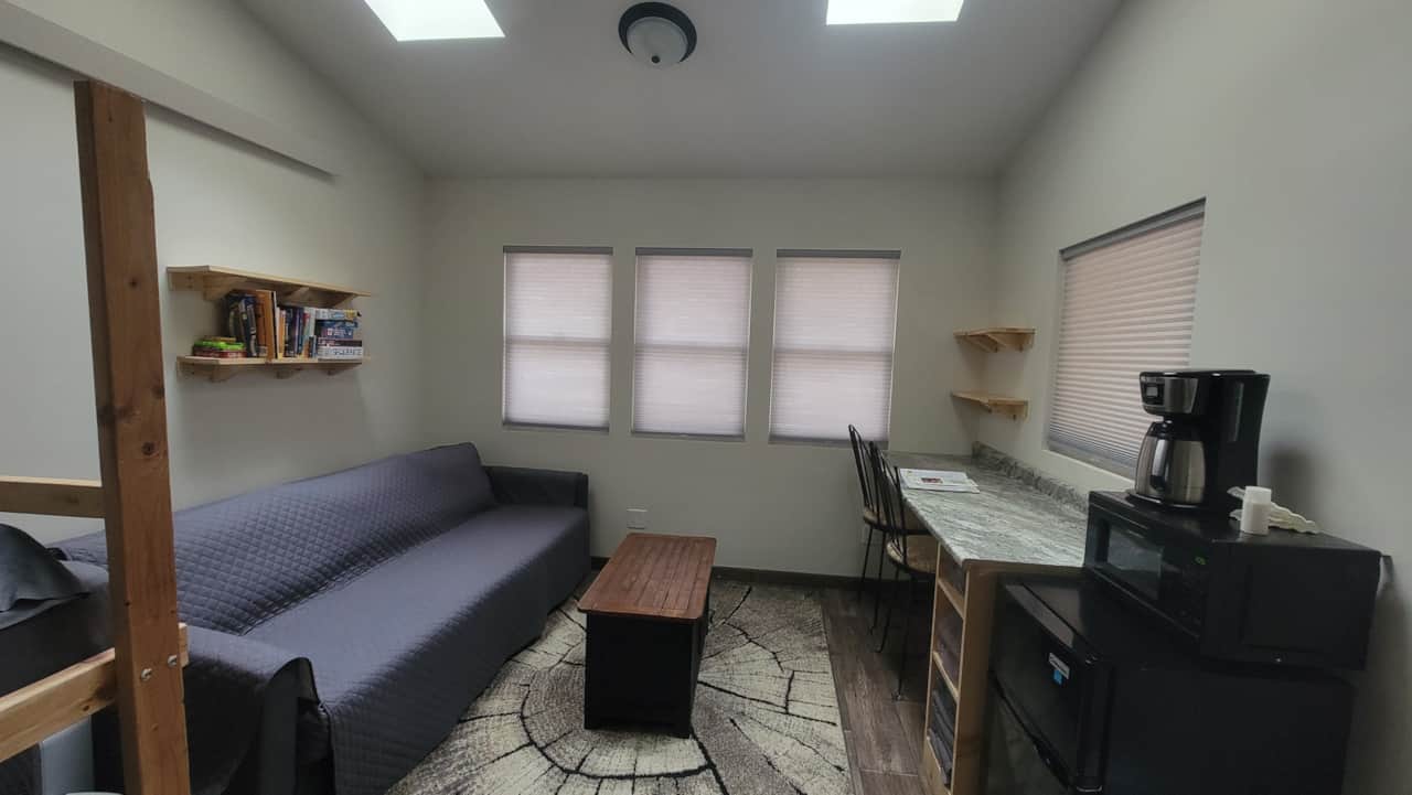 Couch, coffee table and counter top workspace