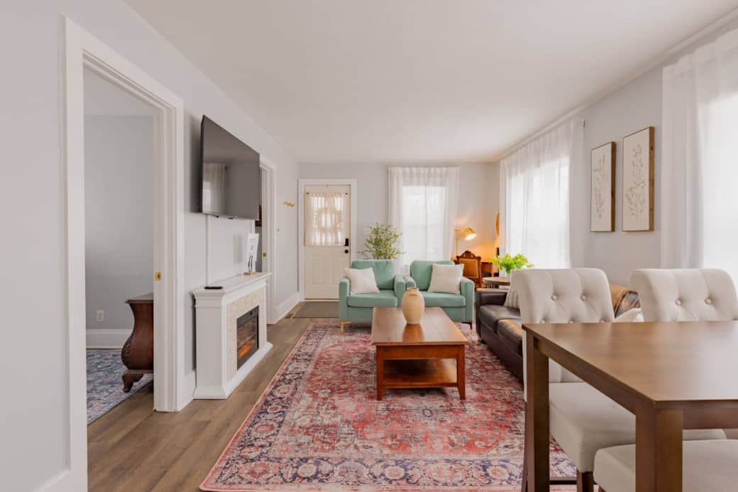 Living room with bedroom doors to the left.