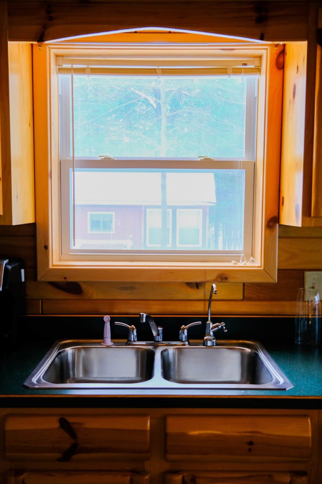 Stainless steel double sink with a convenient filtered water tap. Stainless steel double sink with a convenient filtered water tap.
