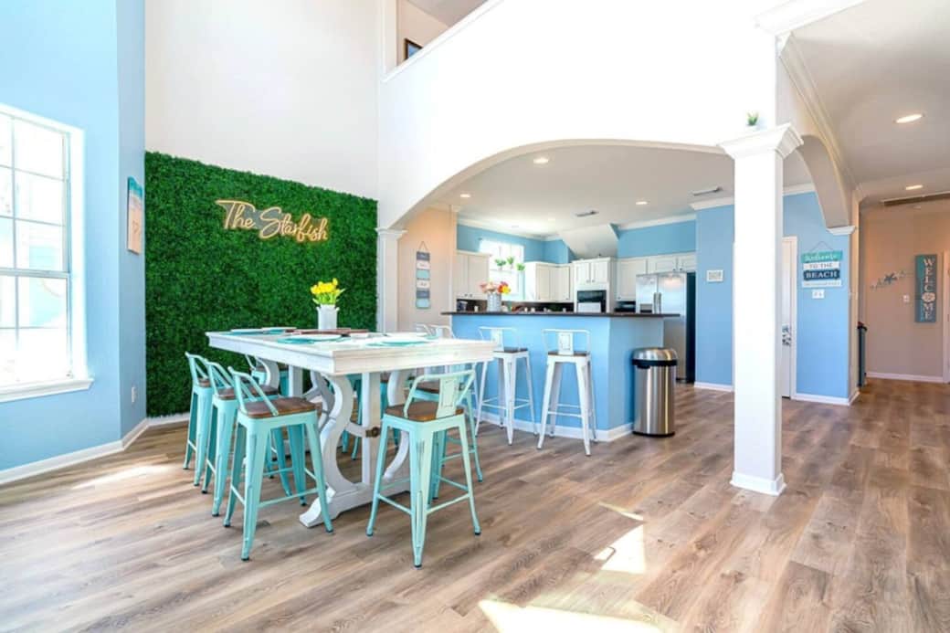 18 Smaller dining table seating 8 people with 4 at the kitchen island. 