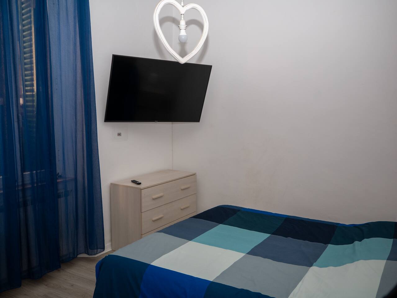 Camera da letto con TV 55"