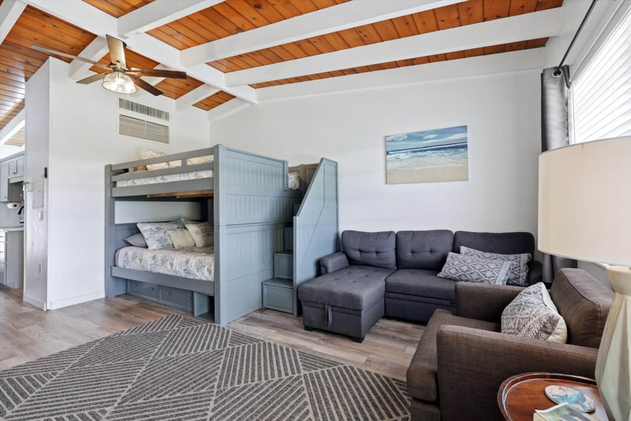 View of bunk beds and couch