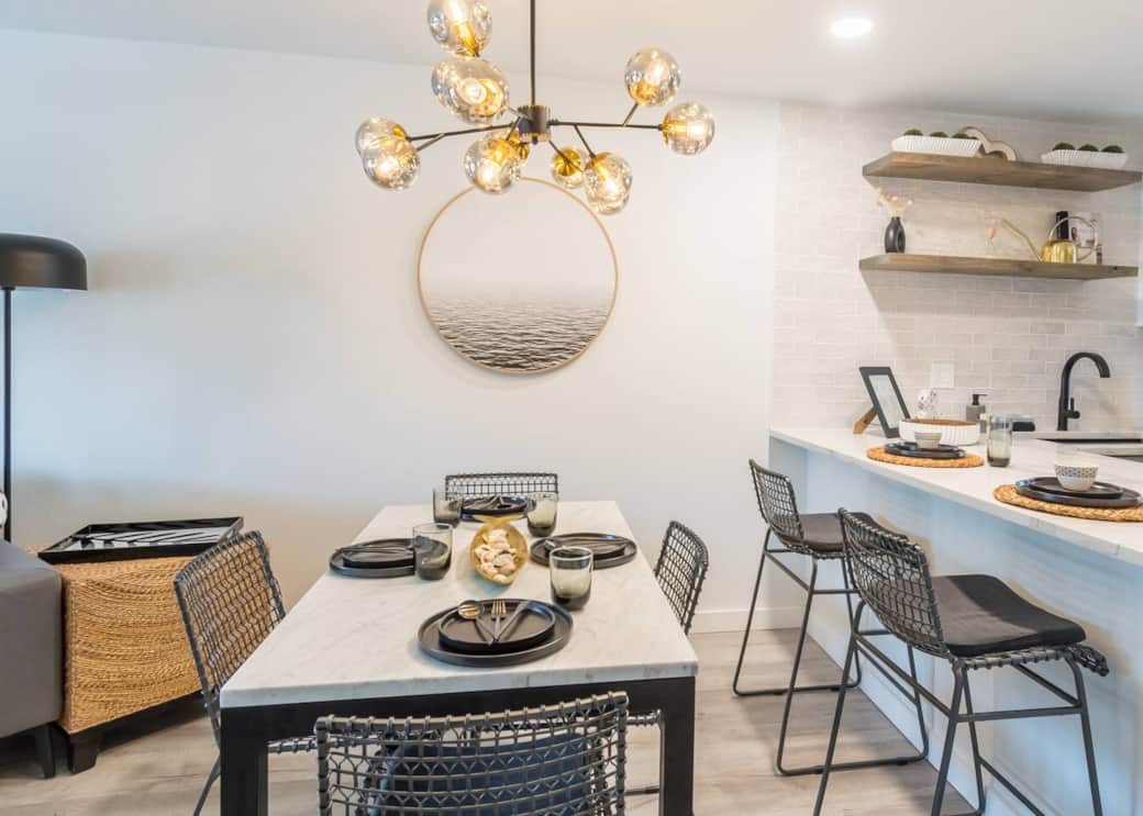 Our four-seat dining table with additional bar space is perfect for family meals. Whether you're cooking a gourmet feast or just enjoying a quick bite to eat, you'll have plenty of space to spread out and enjoy each other's company.
