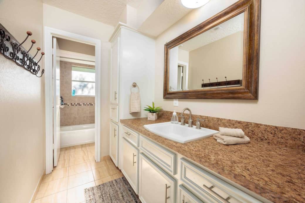 This secondary bathroom has plenty of counter space and storage. In addition, the separate shower/toilet room provides much-appreciated privacy. This secondary bathroom has plenty of counter space and storage. In addition, the separate shower/toilet room provides much-appreciated privacy.