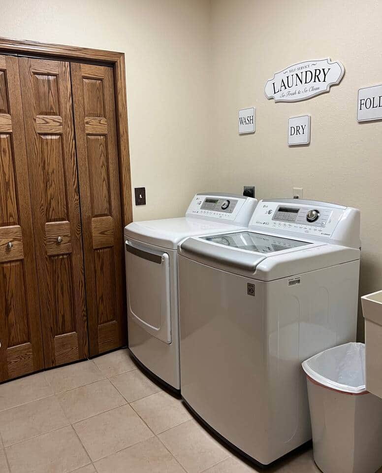 Laundry area that comes stocked with detergent and fabric softener