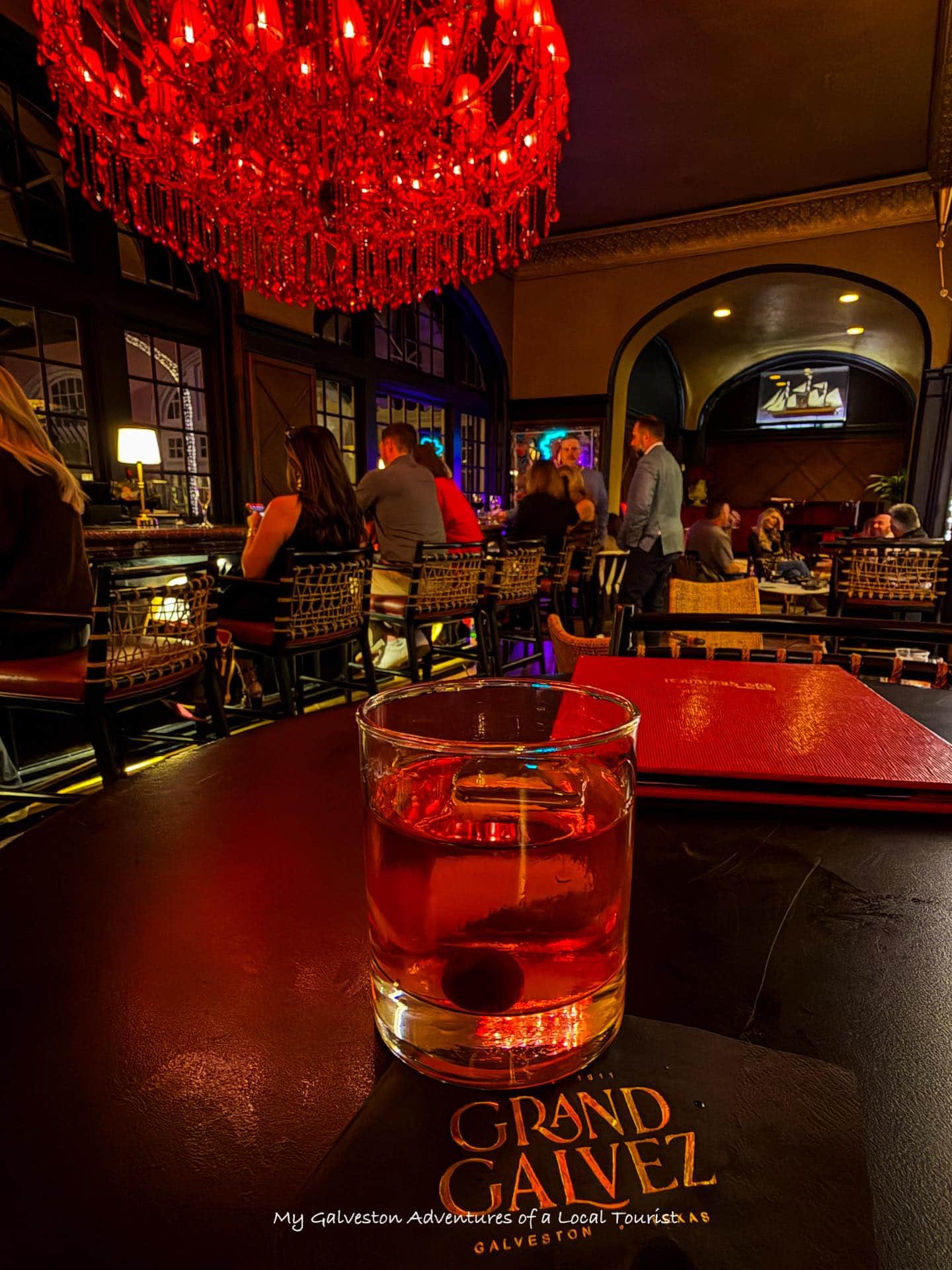 The swanky bar at the Grand Galvez offers signature cocktails and live piano music.
