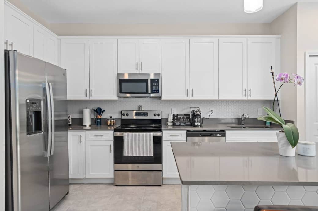 The fully stocked kitchen is designed for convenience and family comfort, making meals easy during your Disney vacation.