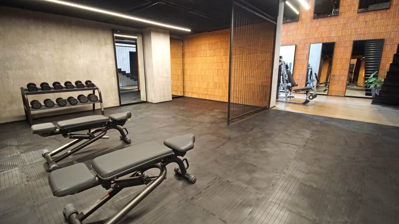 Large workout space with free weights. The gym also has a great sound system with sub woofer.