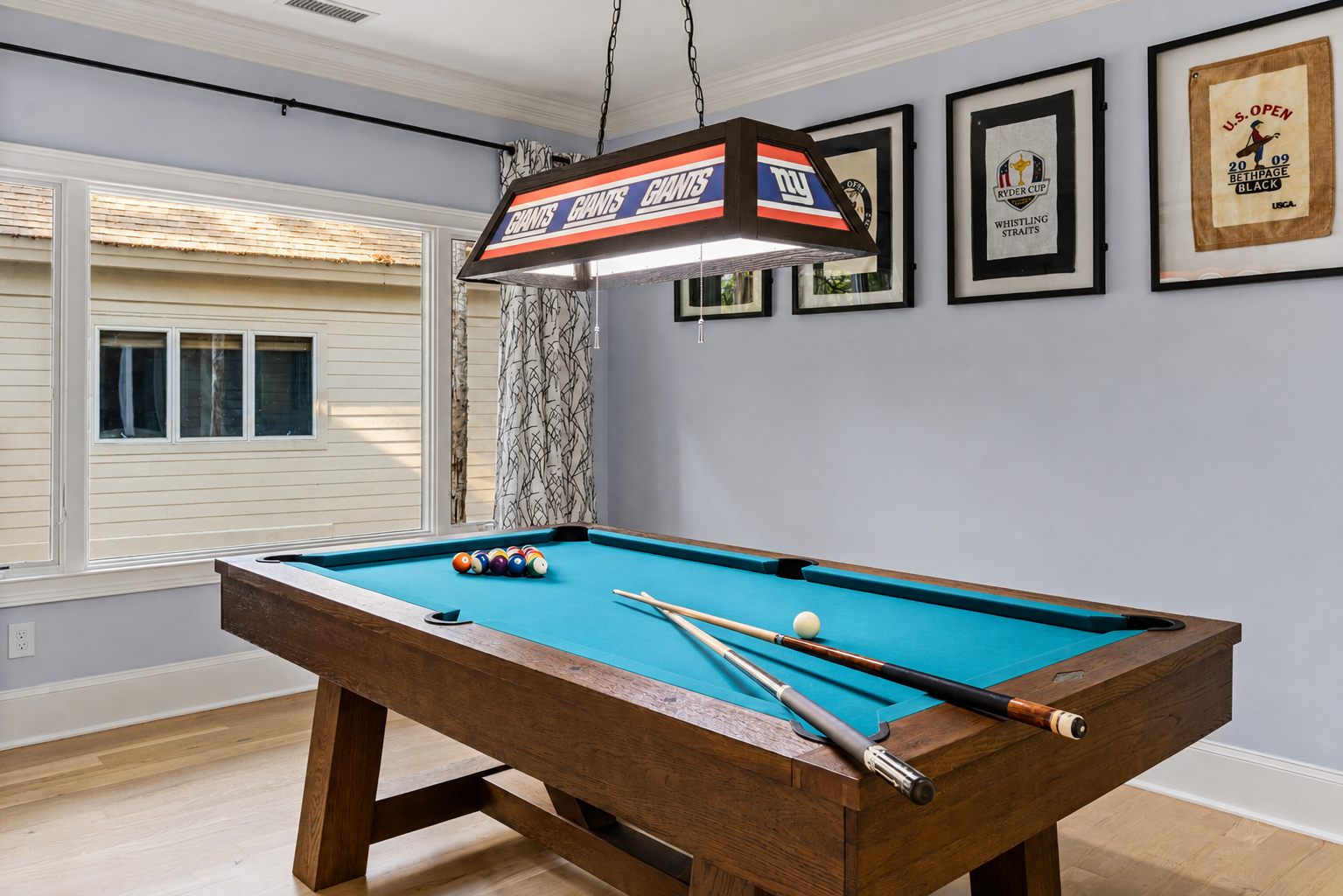 Challenge your crew to a friendly game of pool in this dedicated game room built for fun.