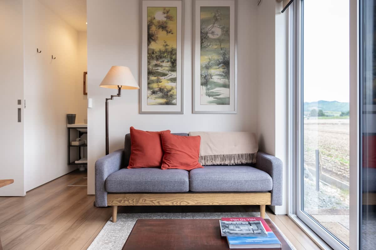 Lounge in 茜Akane 2-bedroom suite and take in Furano's surrounding countryside and mountain views