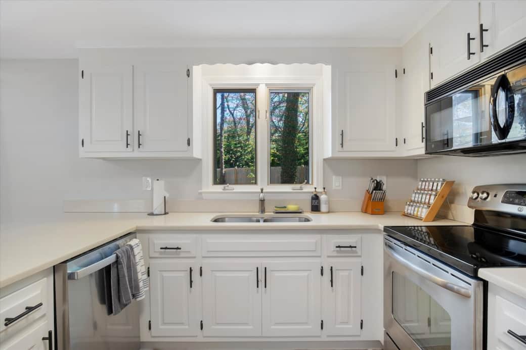 Fully stocked kitchen with stainless appliances