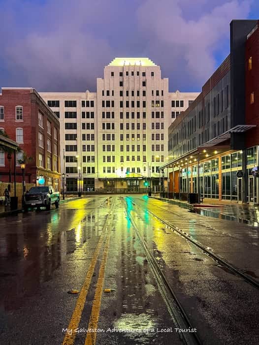Historic architecture and iron balconies in downtown Galveston near the Strand District