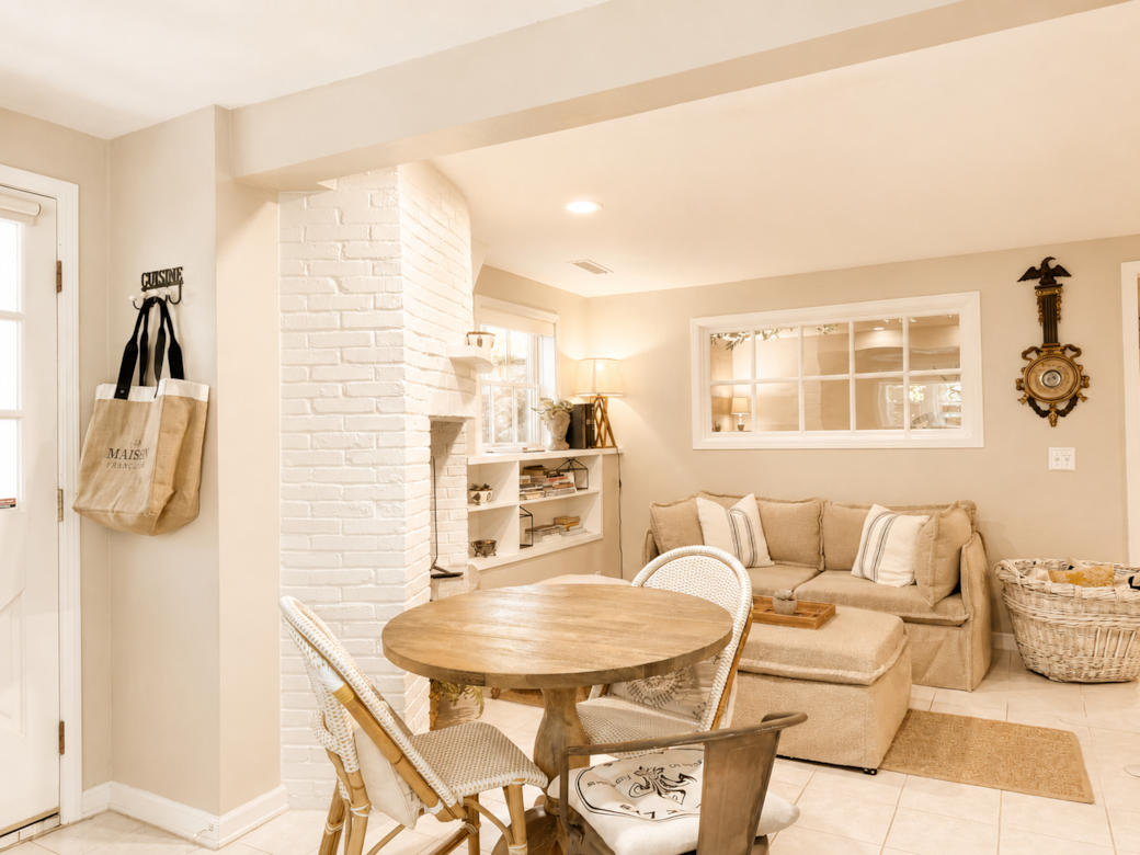 Living area features a comfortable couch and dining space for relaxing and gathering