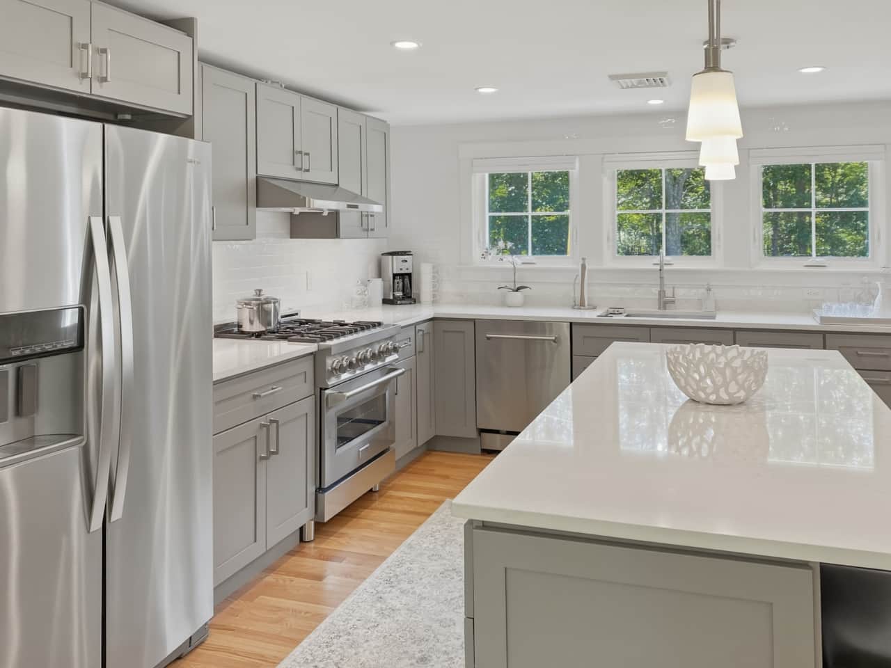 Dual fuel range, dishwasher, disposal, microwave oven.