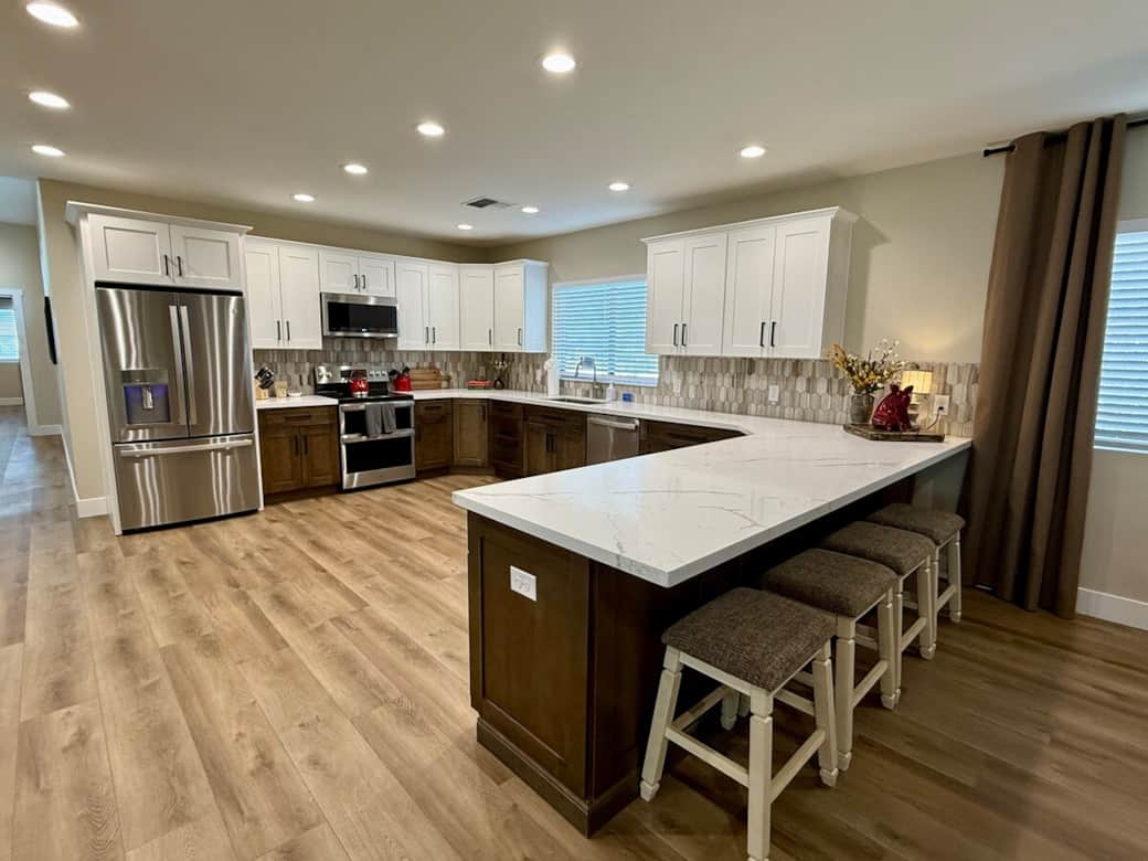 This kitchen is fully equipped with anything a gourmet chef or a basic cook could need. Four barstools are at the peninsula for your family or guests to be involved with the preparation of the meal or casual dining.