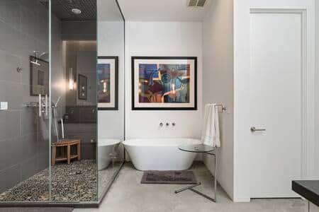 Master bathroom with steam shower, soaking tub, private toilet room and separate dual vanities